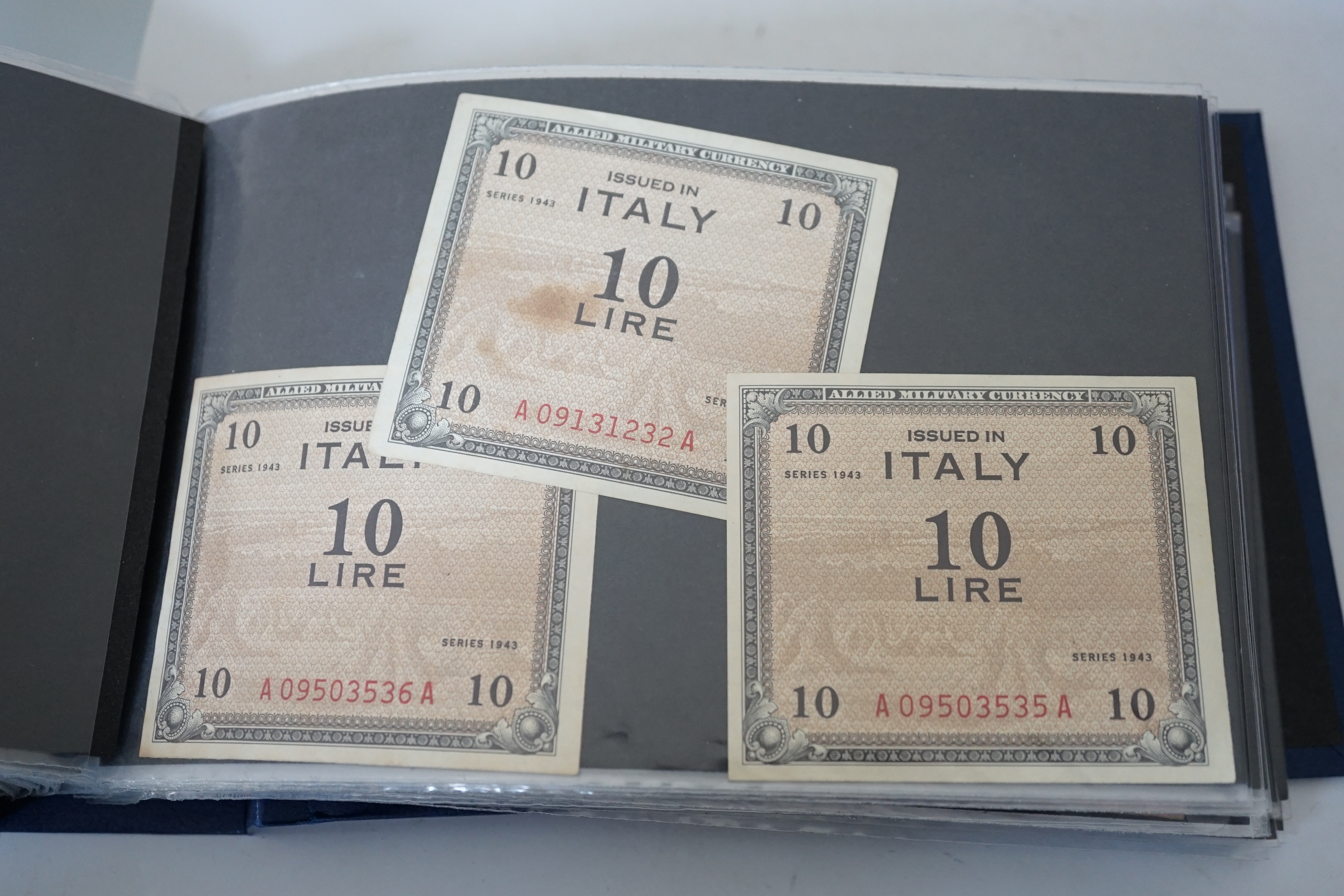 World banknotes, including Birmingham Bank One Guinea (poor), GRVI and QEII 10 shillings, £1, and £5, USA, Egypt, France, Algeria, Italy, Philippines, Russia etc.